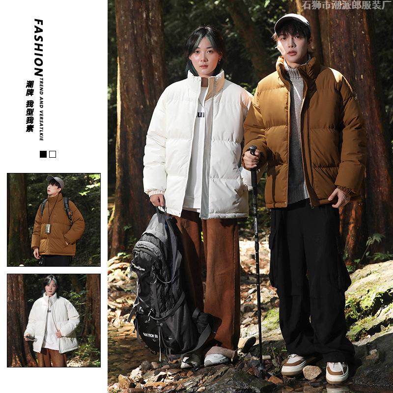 Large size cotton-padded clothes are the same for men and women. Winter thickened stand-up neck cotton-padded jacket, loose thickened cotton-padded 