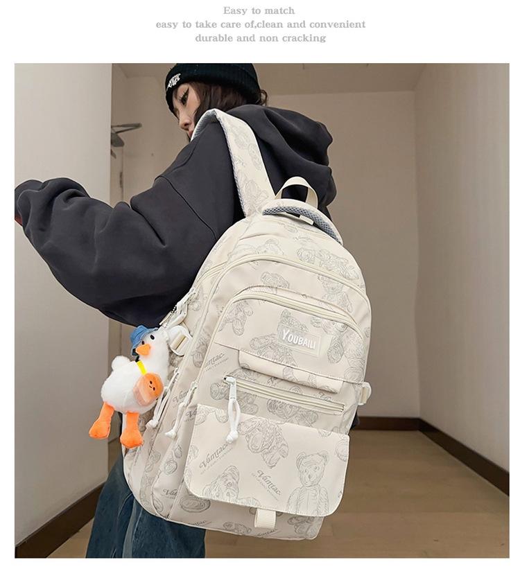 Large Capacity Bear Print Backpack for Students - Perfect for Middle, High School, and University Girls.