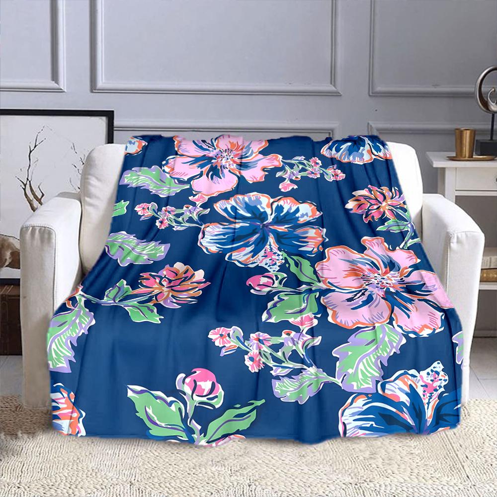 Floral Pattern on Navy Blue Background Patterned flannel blanket perfect for the bedroom living room, sofa, or a little nap