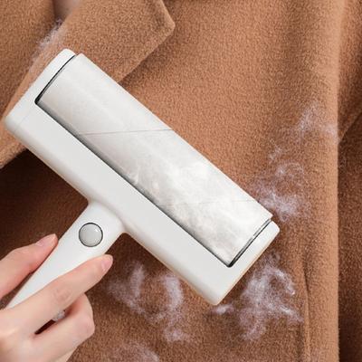 Rouleau adhésif attrape-peluches pour enlever les poils d'animaux avec feuilles détachables et manche réutilisable pour le nettoyage des tapis et meubles de la maison