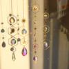 Crystal Sun Catcher Ornament - Solar Crystal Ball with Moon, Stars & Prism Hanging for Garden and Home Decor