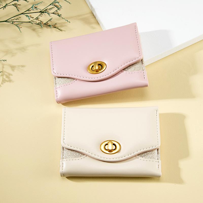 Women's short wallet, cute large capacity, multi-card position, simple ins student lock 30% off change bag tide