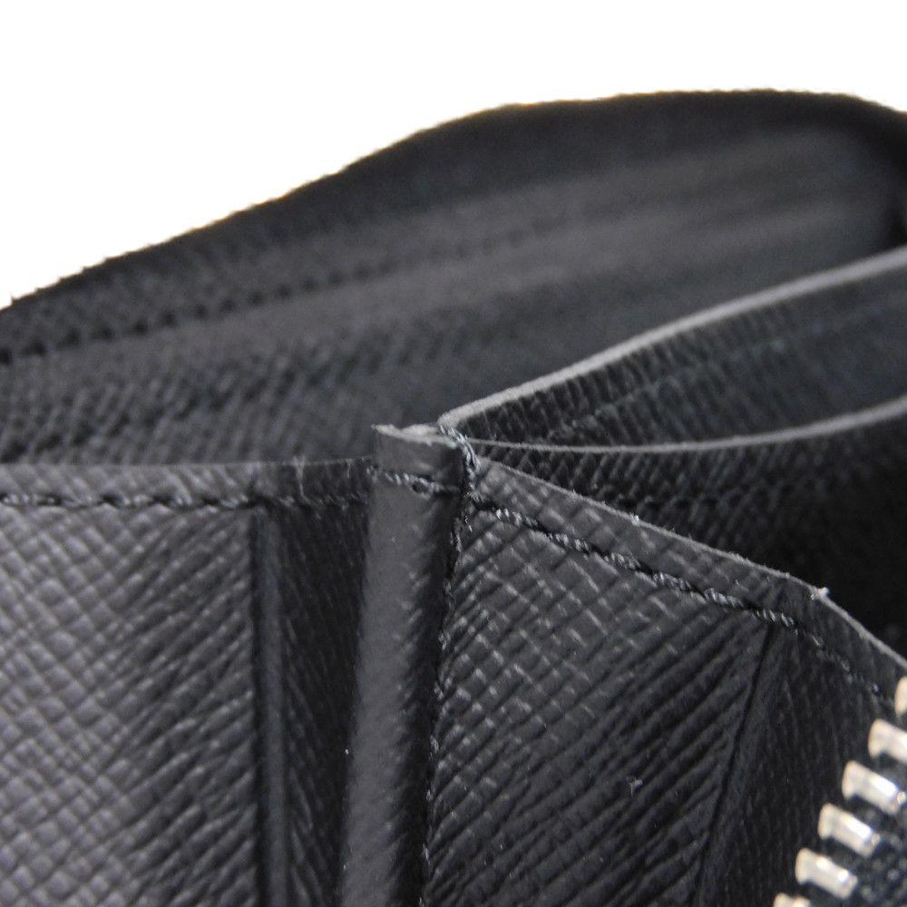 Used 12564 Zippy Coin Purse M30511 7943 New LV Logo Embossed Black Zip Around Taiga Noir Men's from Japan AUTHENTIC