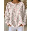 Waffel-Sweatshirt mit frischem Blumen- und Pünktchen-Print, rundem Halsausschnitt mit Knöpfen und langen Ärmeln.