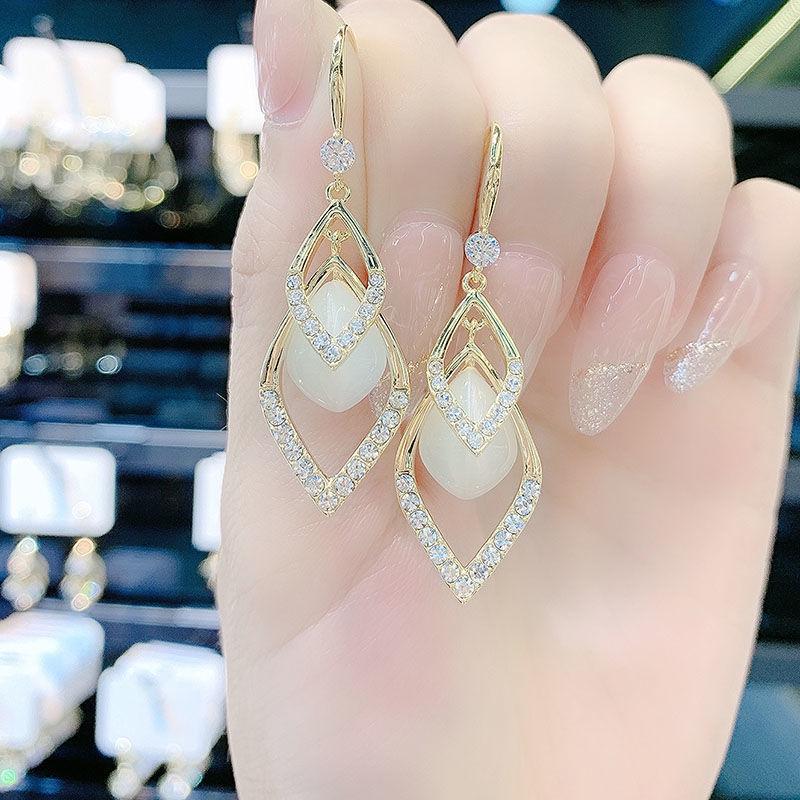 

Серьги-пусеты из серебра 925 пробы в форме прямоугольника и ромба с многослойной квадратной подвеской