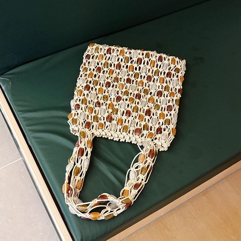 Summer new casual beaded bag for women, fashionable high-end woven handbag with lattice hollow-out wooden beads, beach bag