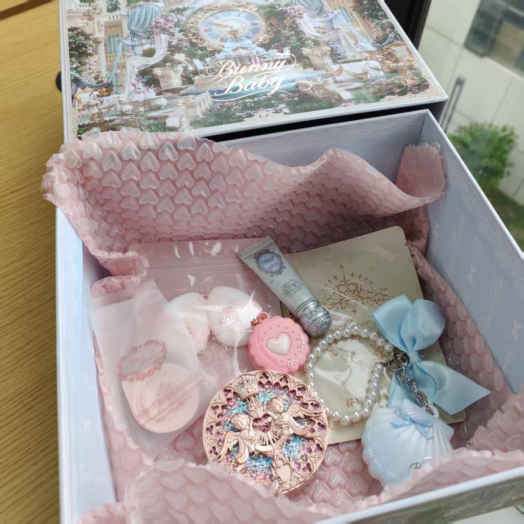 Flower Knows Surprise Blind Box Set (3-4 products) with randomly included items such as eyeshadow, blush, lipstick, and small accessories.