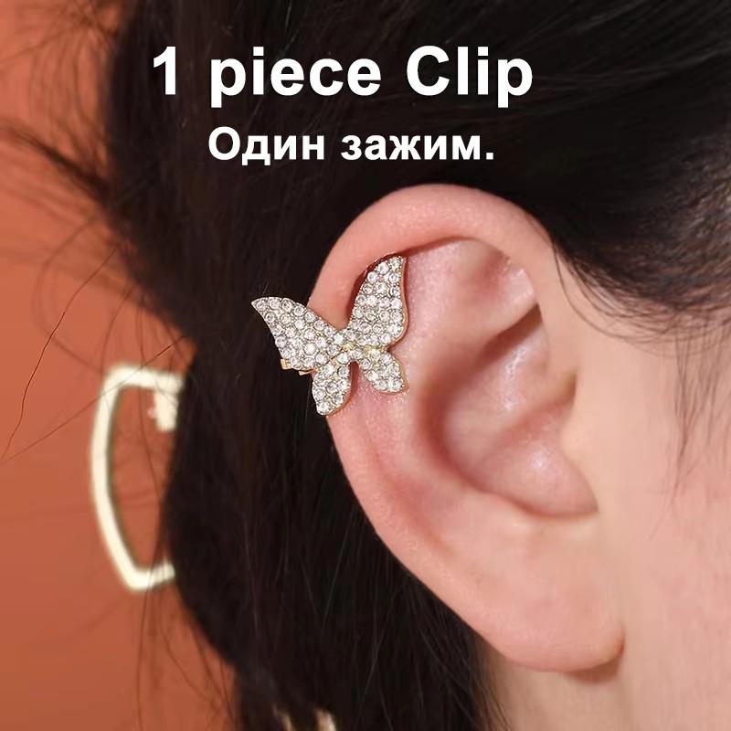 Boucles d'oreilles tendance papillon pour femmes Émail noir Petit cristal Papillon creux en forme d'animal creux Boucles d'oreilles pendantes pour femme