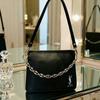 Handmade DIY Black Square Bag, with a Retro and High-end Style, Adorned with Golden Chains and Classic Logo.