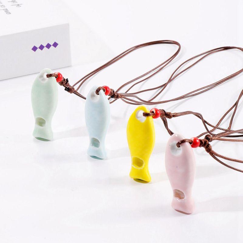 

Jingdezhen Ceramic Ornament Small Fish Whistle Cute Cartoon Whistle Can Blow Student Female Necklace Pendant New Arrival Fish whistle mixed hair one