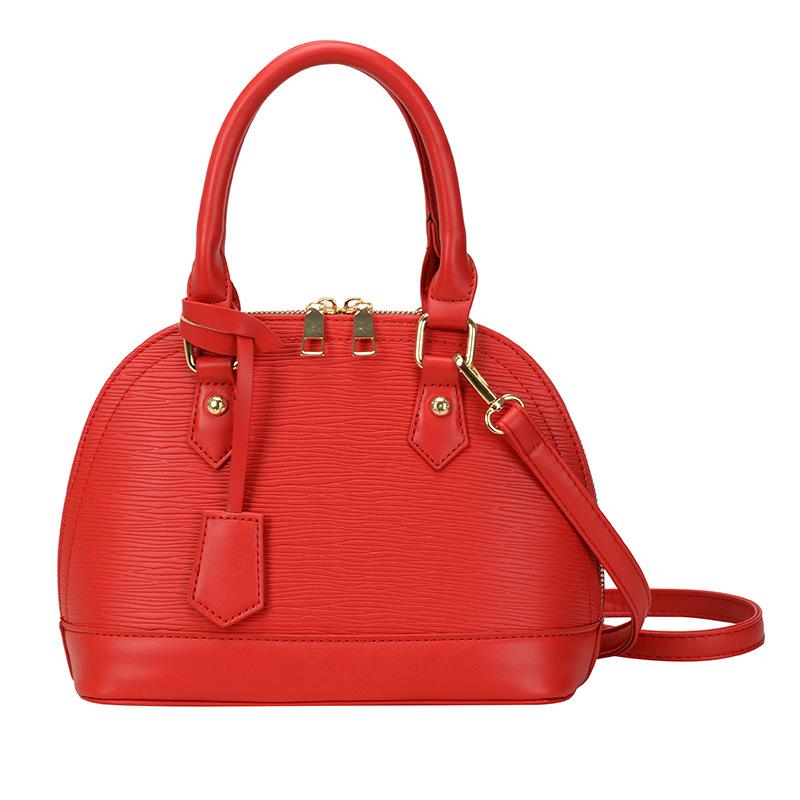 High-value niche design women's bags, fashionable and popular women's shell bags, large-capacity Korean shoulder messenger bags.