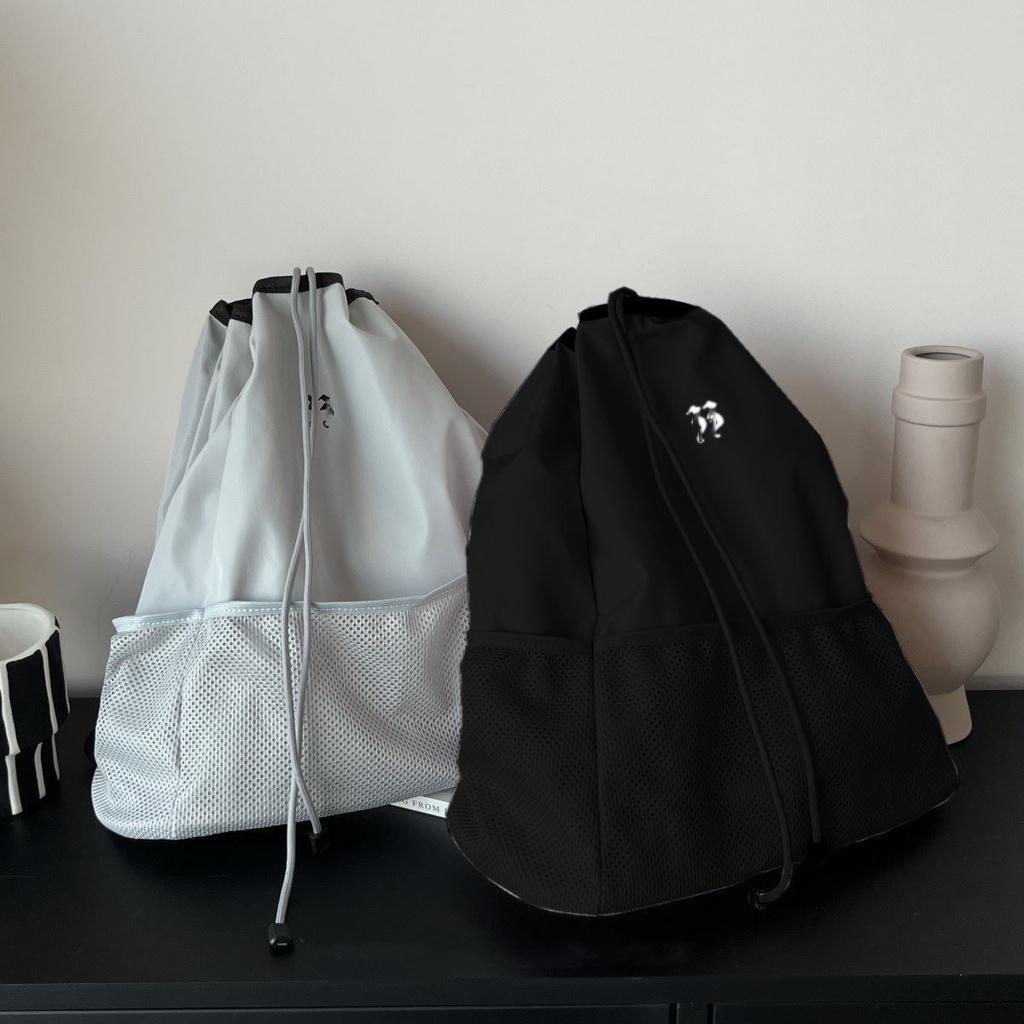 Large capacity nylon sports and leisure backpack 2025 new versatile drawstring schoolbag Korean niche shoulder bag tide