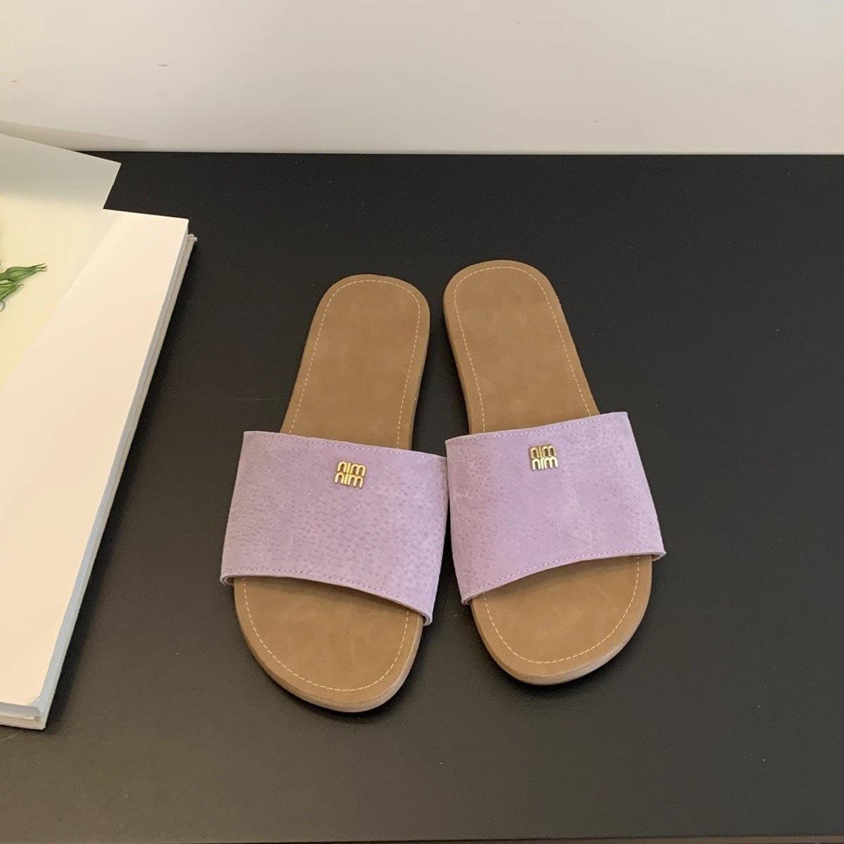 

Slippers women wear summer new one-word drag seaside vacation soft flat-bottomed beach shoes 40