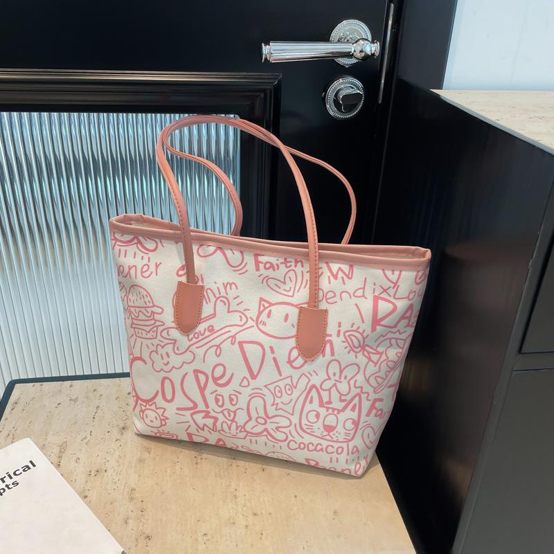 

Холщовая сумка с граффити женская 2025 новая повседневная сумка через плечо универсальная большой вместимости студенческая сумка-тоут для учебы/работы розовый