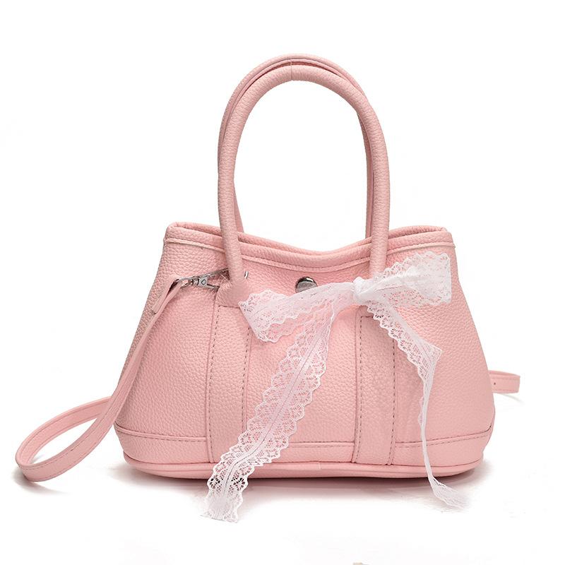 Korean fashion simple casual style portable bucket bag femininity high sense commuting versatile solid color messenger bag