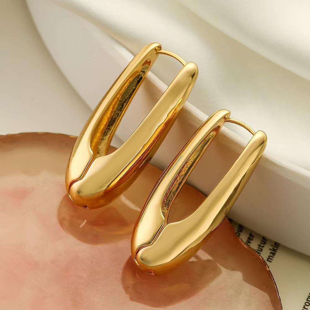 Simple Glossy Oval Water Drop Ear Buckle Feminine Temperament Geometric Earrings Feminine Cold Wind Advanced Sense Light Luxury Earrings