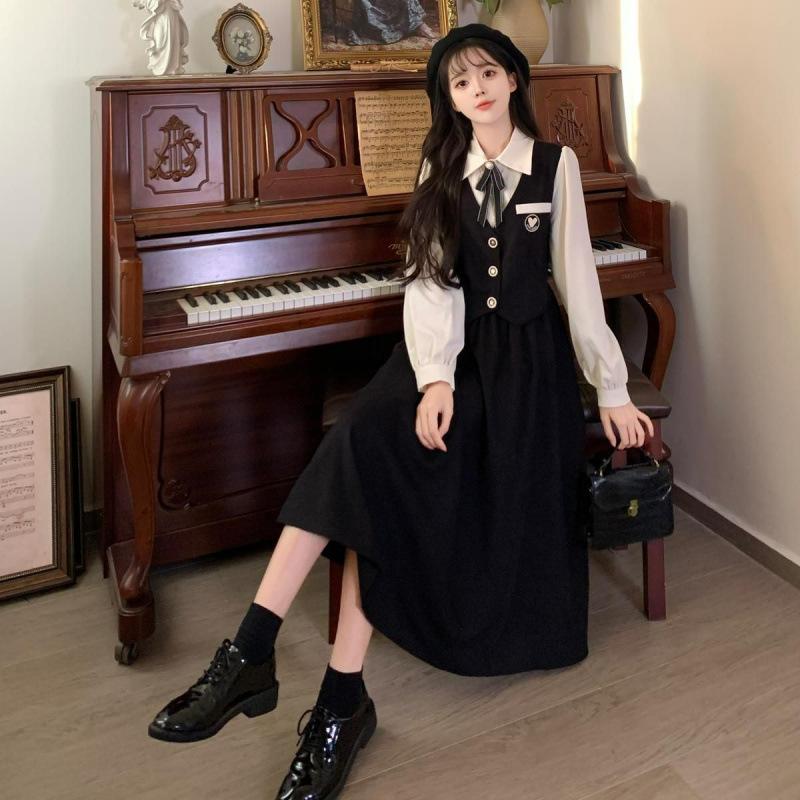 Age reduction long-sleeved college style dress women's clothing autumn and winter new models to cover the belly and show thinness fake two skirts