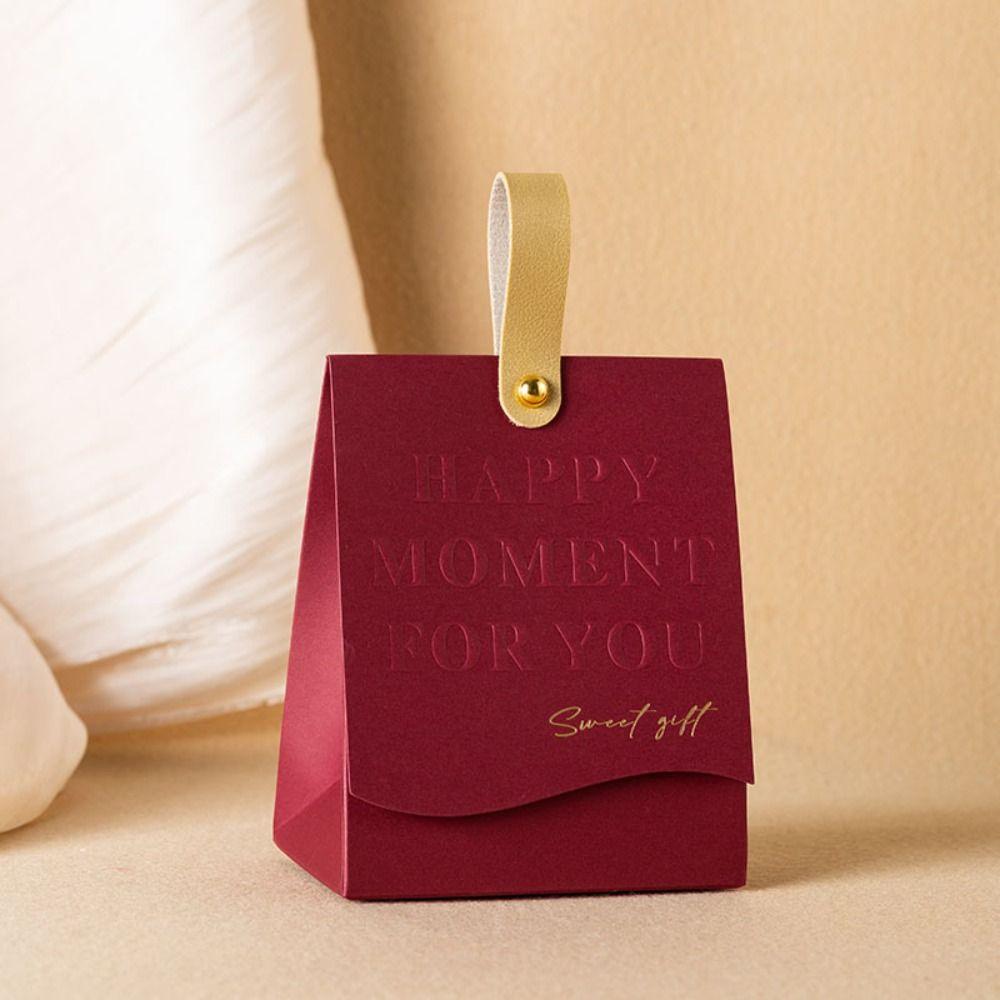 

With Handle Embossed Printing Candy Box Creative Handle Bag Gift Packaging Box Valentine s Day