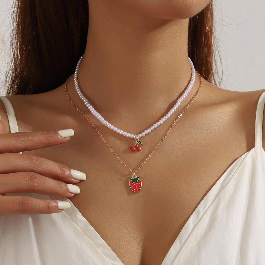 

Cute Strawberry Bowknot Heart-shaped Pendant Imitation Pearl Collision Color Multi Layer Wear Necklace for Women Zircon Set