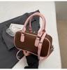 Hand carry baseball bag women's retro versatile shoulder bag autumn and winter niche high-end casual women's bag