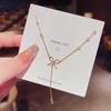 High-End Titanium Steel Bow Tassel Necklace: Elegant, Super Fairy Fashion for Women, Trendy Clavicle Chain