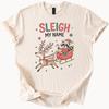 Christmas Raccoon Sleigh Ride T Shirt Holiday Reindeer Candy Cane Funny Graphic Tee Cute Animal Santa Hat Festive Apparel Gift