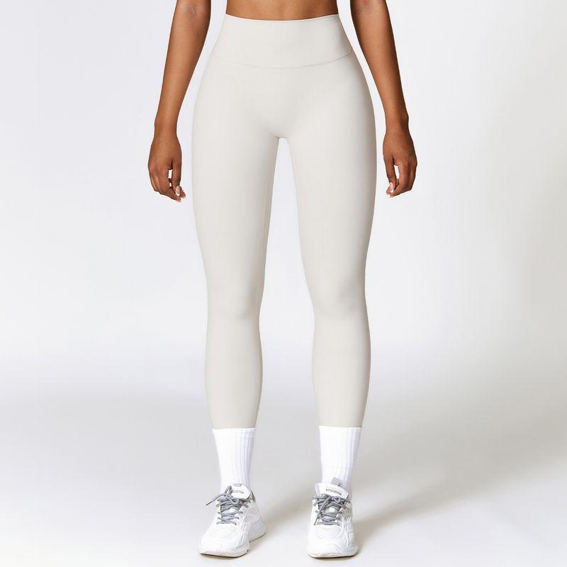 Nude Feel Yoga Pants Women's 2025 New Arrival Peach Hip Seamless Belly Contracting and Close-Fitting Outwear Running Sports Quick-Drying Fitness Pants