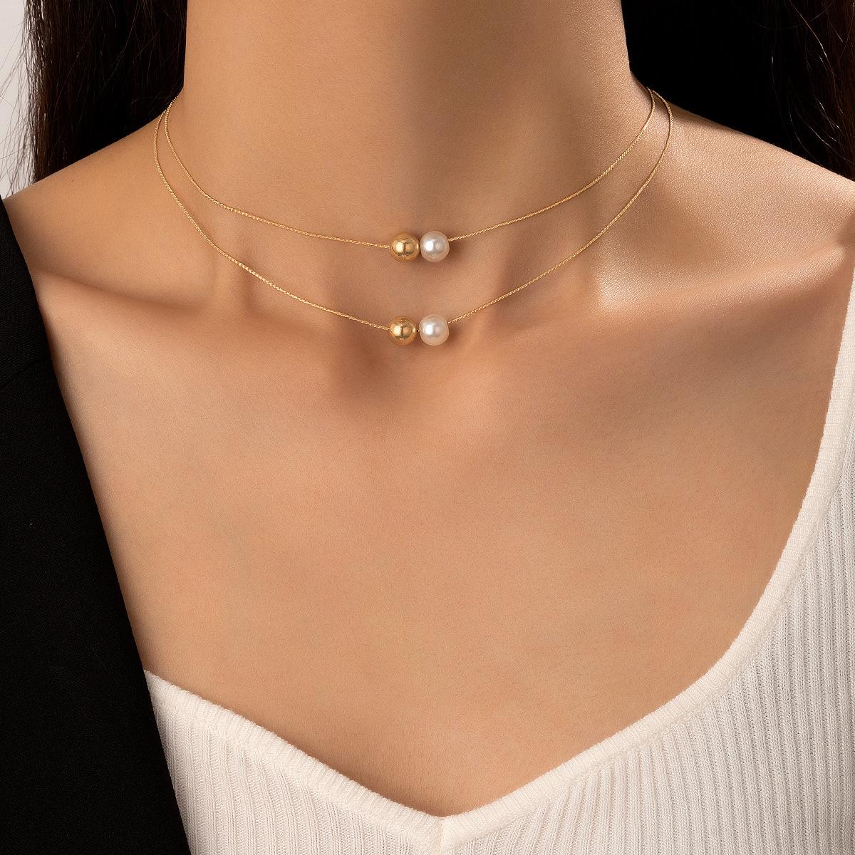 

New, fashionable and versatile silver metal bean pearl necklace for women, elegant temperament and wearing collarbone chain necklace decoration золотий