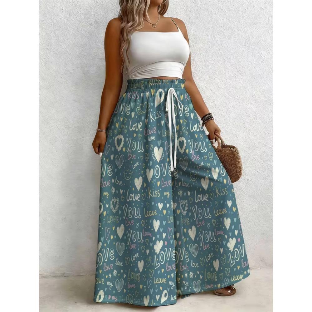 Large size women's printed loose wide leg pants, elegant with pockets, suitable for vacation and daily wear