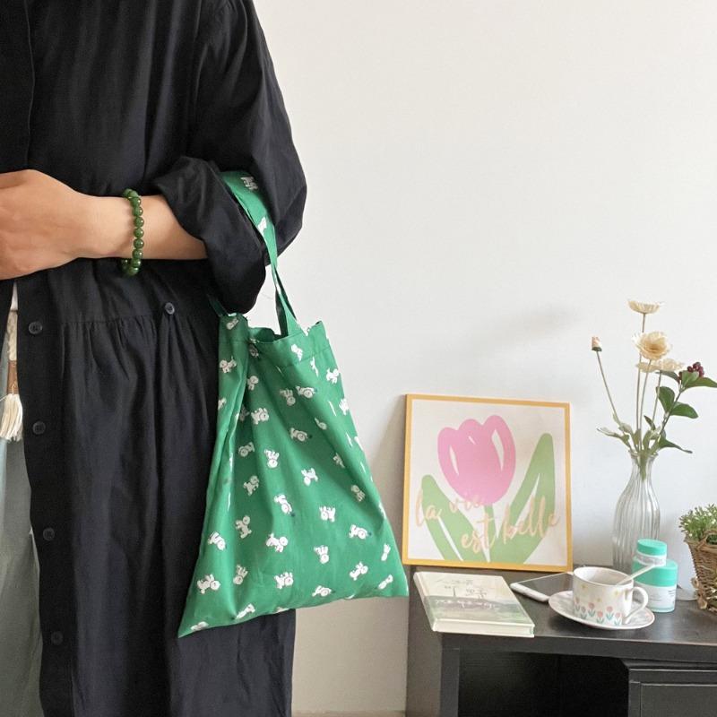 

Japanese and Korean cartoon cotton printed cloth dark green base color cute dog thin shoulder bag hand bag versatile daily bag without puppy pendant