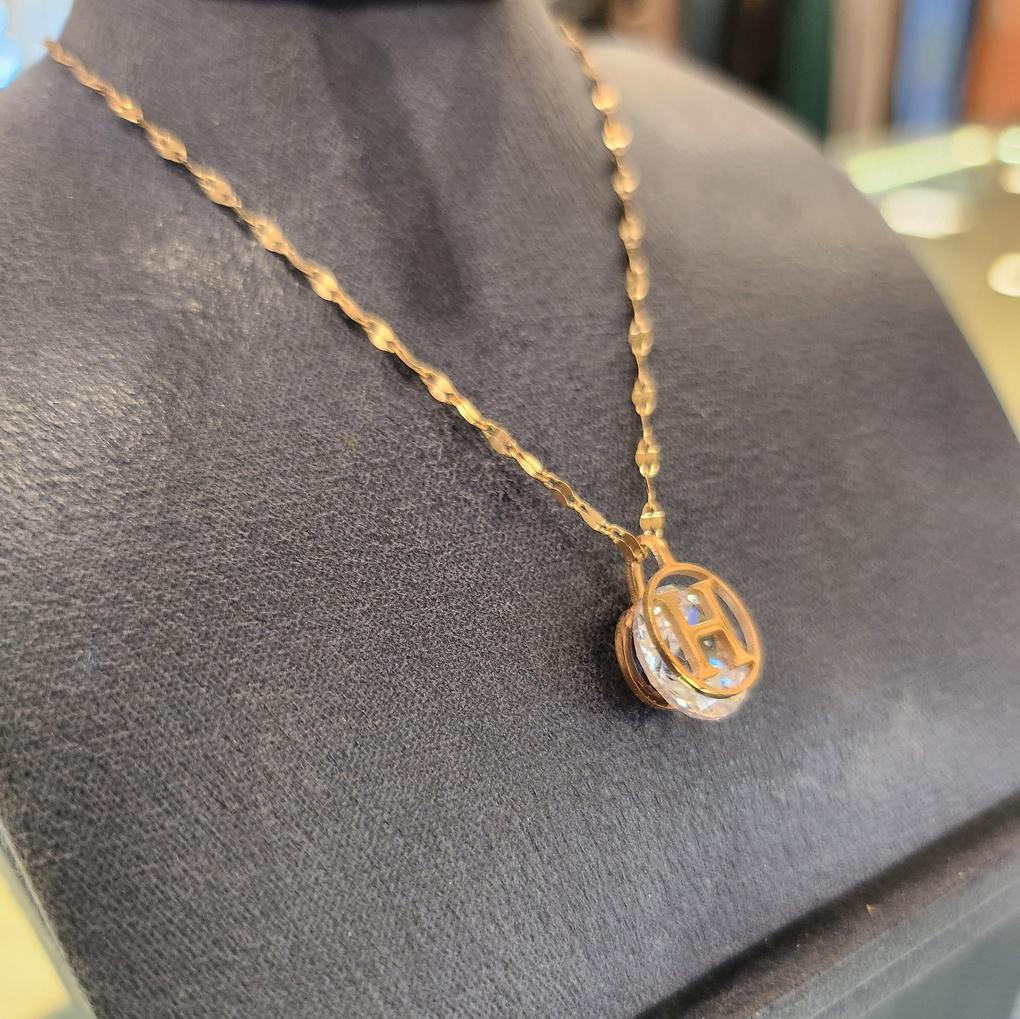 Atria H Crystal N Steel Twisted String Necklace EWSSNSC0019PKF