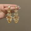 Diamond Inlaid Silver Needle Teardrop Earrings - Elegant Court-Style Jewelry with a Luxurious Touch.