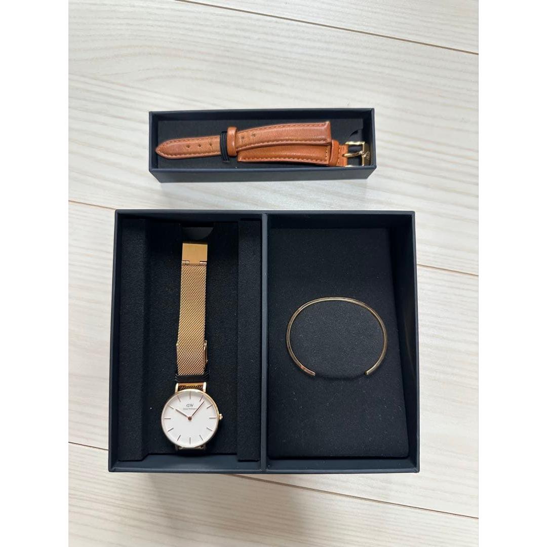 Used Battery replaced Daniel Wellington watch and bangle set gold