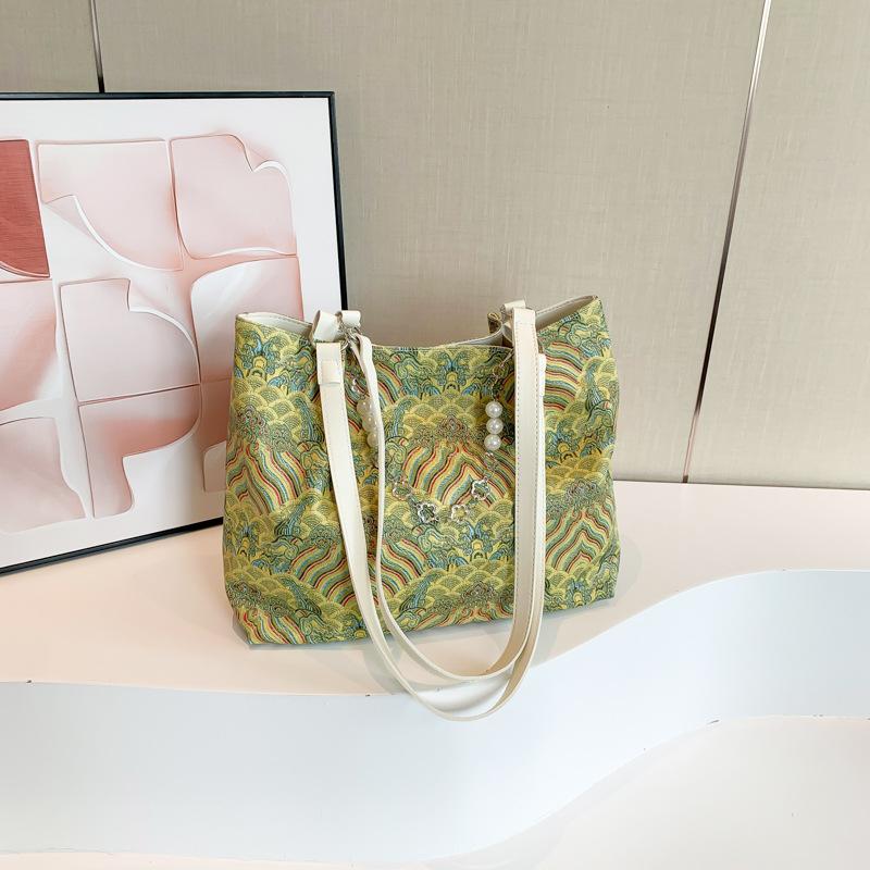 

Новый стиль Литературный китайский стиль Сумка Женская мода Тенденция Женская сумка через одно плечо Сумка-тоут Сумка через плечо с цепочкой