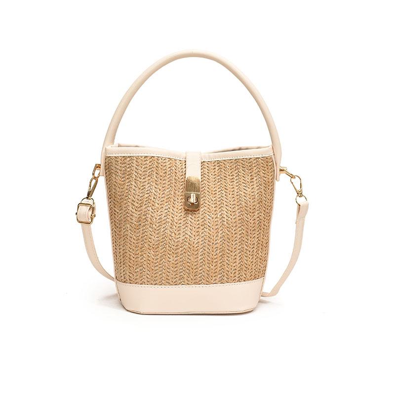 Damska torebka kubełkowa ze słomy w blokach kolorystycznych na wiosnę/lato 2024 - wszechstronny design w stylu francuskim