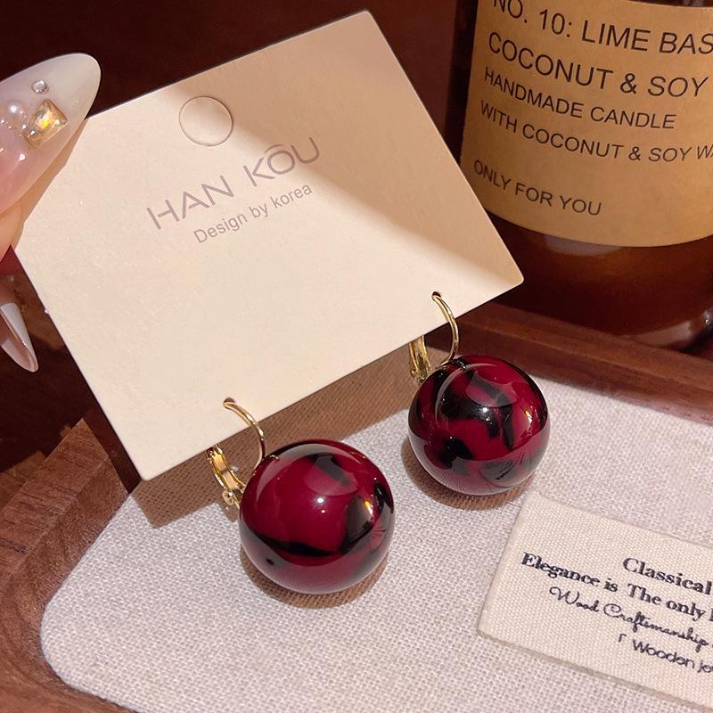 2024 Fall/Winter Leopard Print Light Luxury Resin Ball Earrings for Women - High-End, Niche Design, Internet Celebrity Favorites