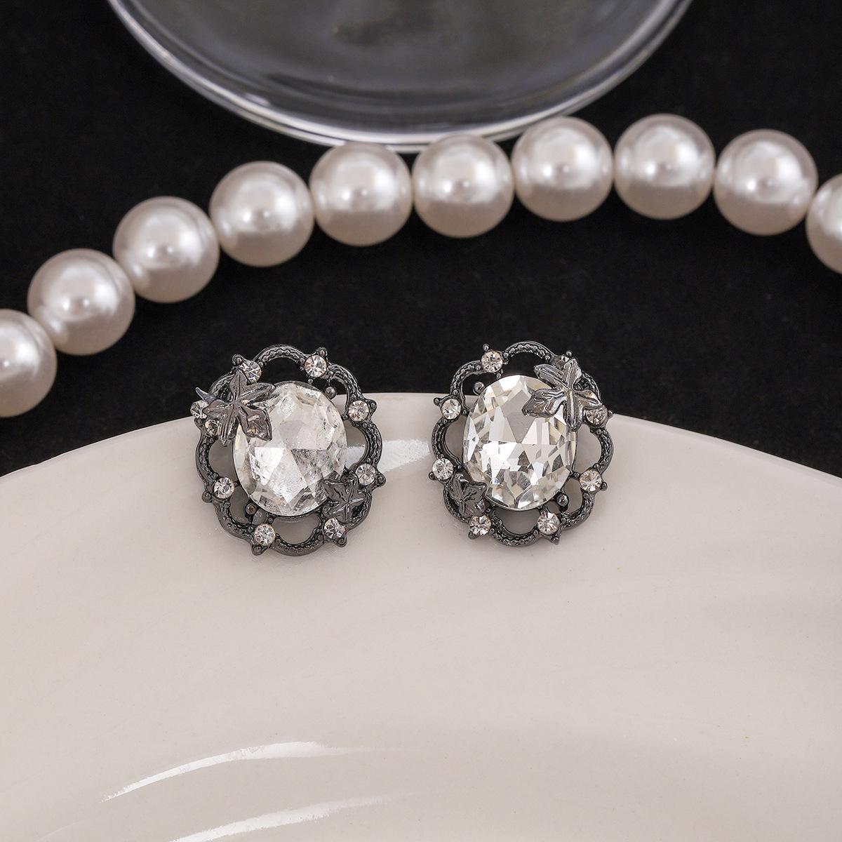 

Изысканные геометрические овальные серьги Silver Needle с инкрустированными бриллиантами - Сверкающий полый дизайн для женщин