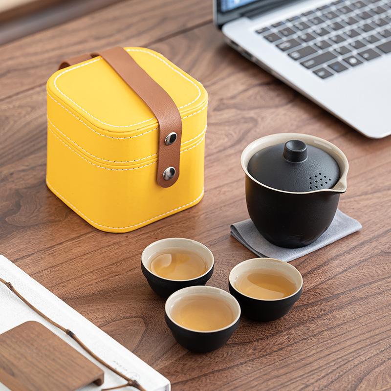 

Travel tea set Camping portable outdoor tea set Black pottery Kuaike cup One pot Two cups Storage bag Business gifts