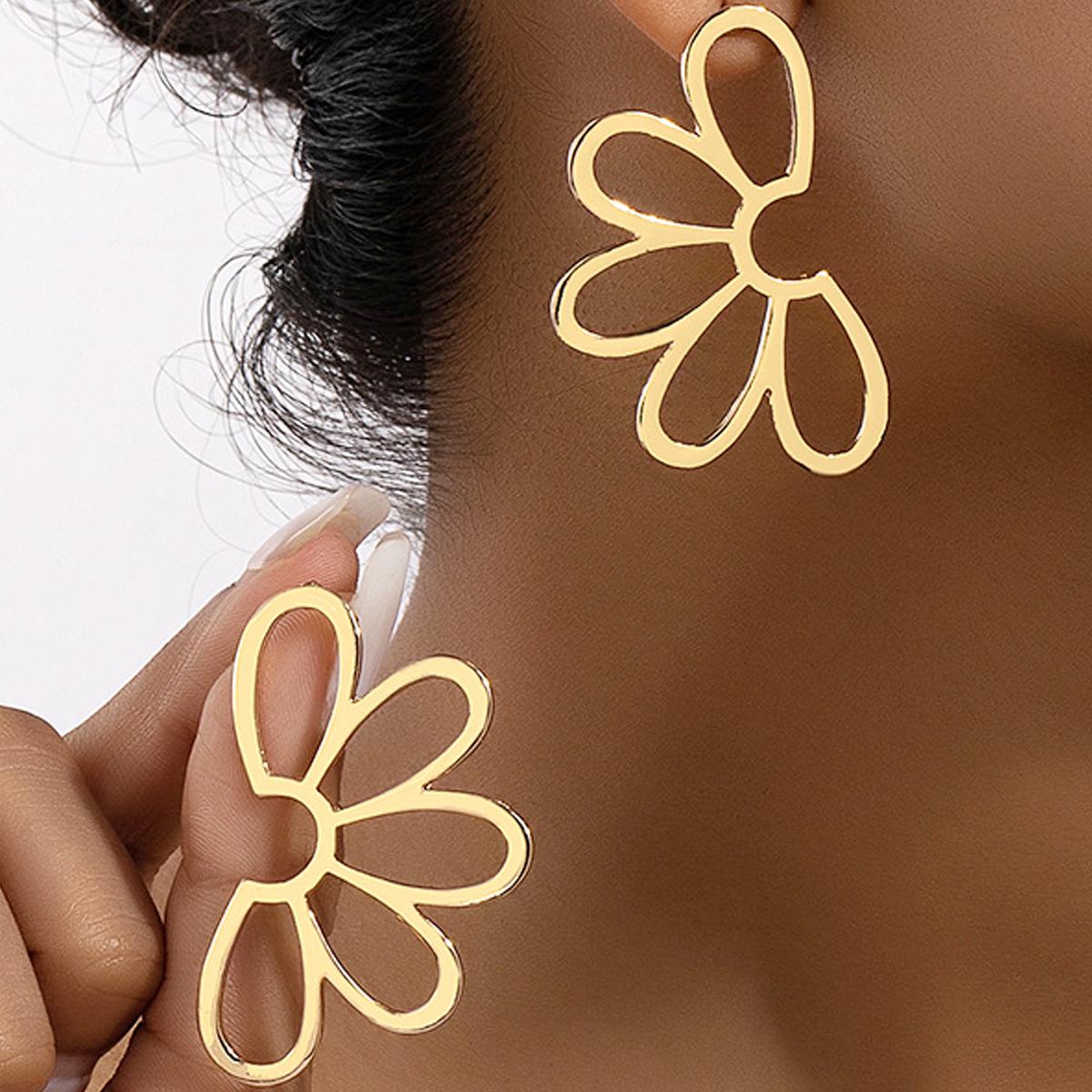 

Высококлассные европейские и американские модные серьги из сплава с полым цветочным узором золотой