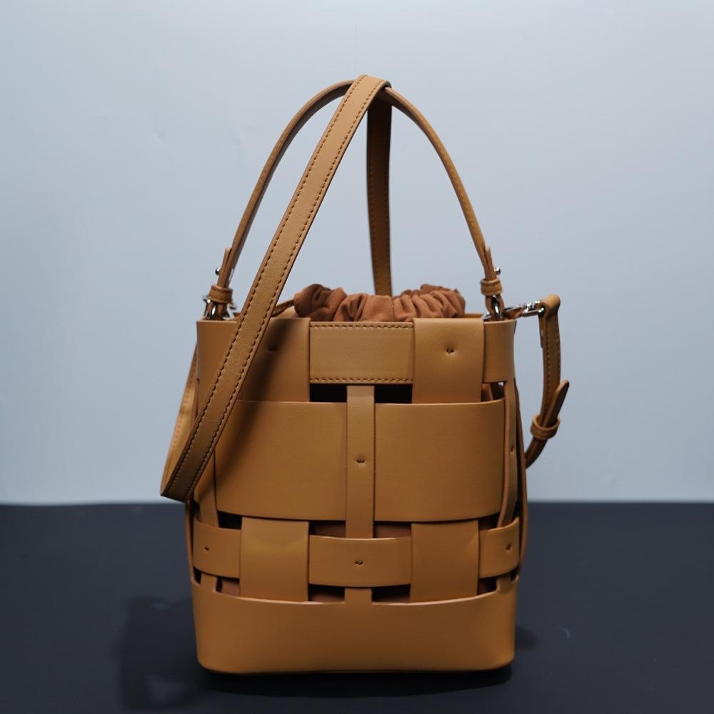Genuine leather niche hollow design European and American fashion versatile woven handbag cowhide shoulder bag bucket bag crossbody
