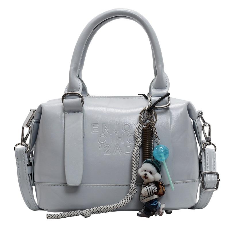 Korean Version of the New High-end College Temperament Portable Pillow Bag Women's Leisure Commuting Versatile Messenger Boston Bag