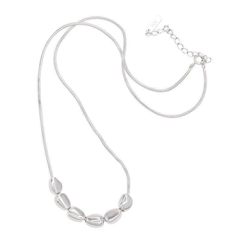 Silver Irregular Bean Necklace for Girls: Japanese Korean Style, Sweet and Cool, Versatile Clavicle Chain with Light Luxury Niche Design.