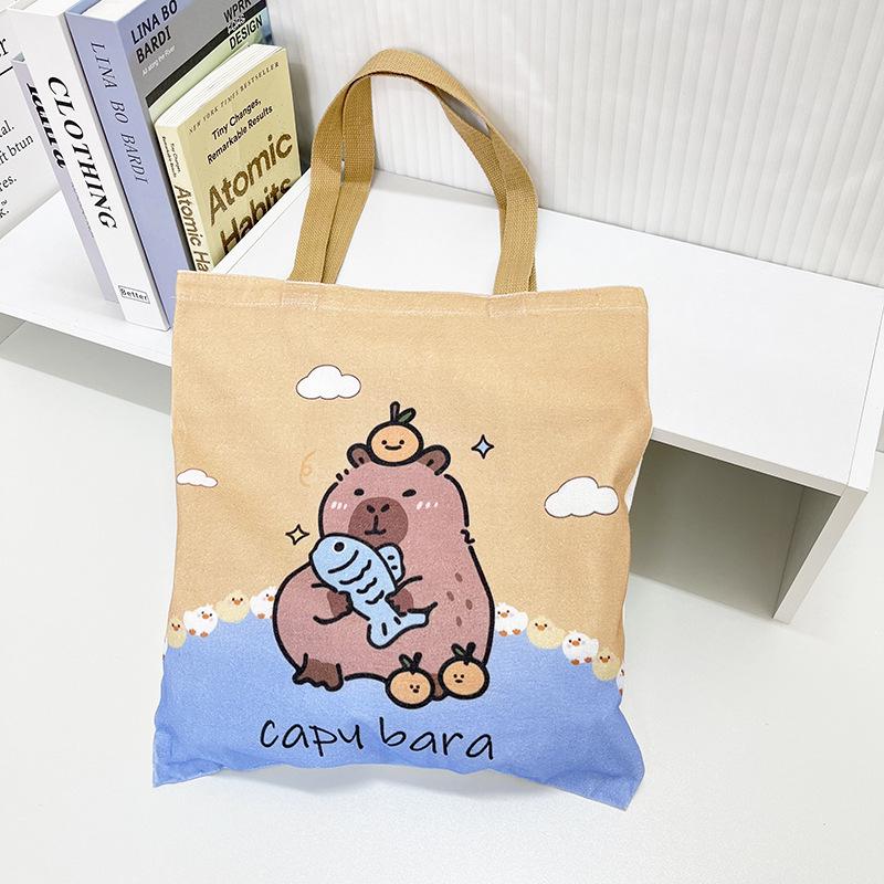 

Нова полотняна сумка Capybara через плече: Стильна сумочка великої місткості для студентів і жінок 35x40 cm, 120g