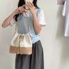 Neue koreanische Patchwork-Schultertasche mit Kordelzug für Damen, modisches Nischenprodukt, geräumige Canvas-Tasche für Pendler