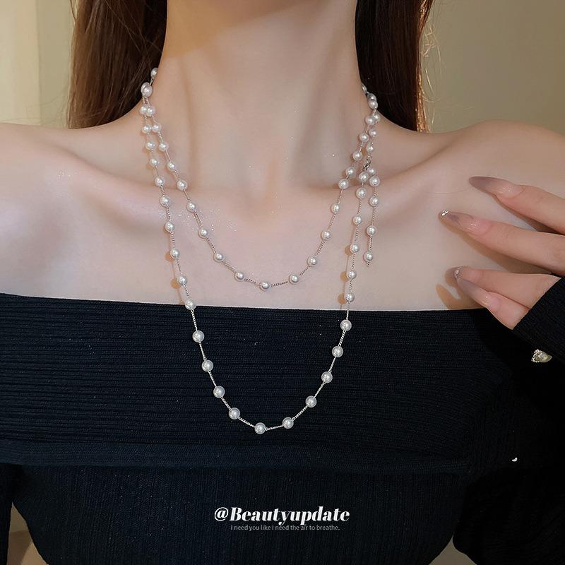 Artificial pearl beaded stacked necklace women's French retro autumn and winter sweater chain light luxury high-end dignified jewelry