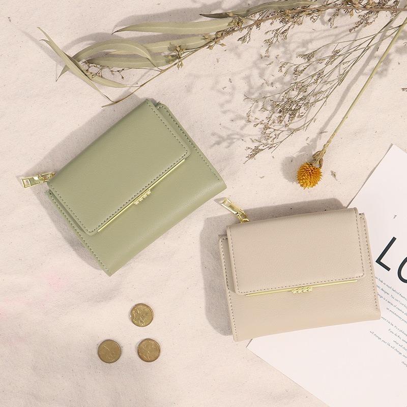 Short wallet, female new model, Ms. Xia folding change bag, student card bag, contrasting color and waterproof function