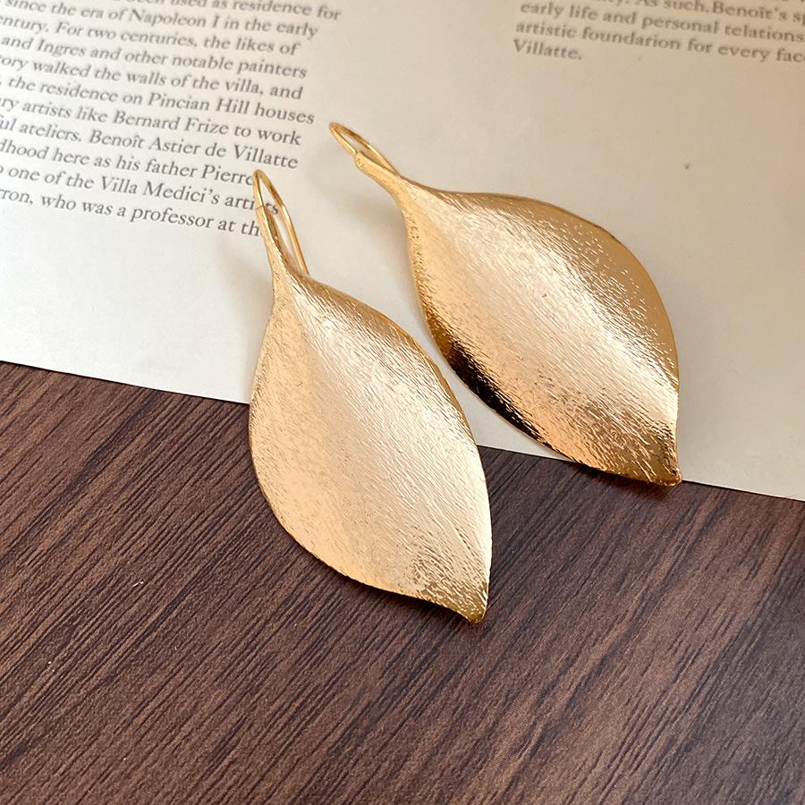 

K real gold electroplated leaf pendant ear hook personality simple fashion temperament earrings light luxury high-end earrings women