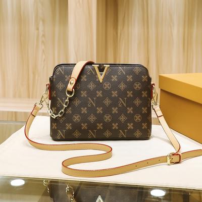 Bolsos de mujer nuevos de moda de primavera y verano, bolsos cuadrados pequeños clásicos estampados para el hombro, bolsos bandolera de cadena de moda nicho para mujer