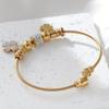 Bracelet bracelet chanceux trèfle à quatre feuilles en acier inoxydable plaqué or 18 carats, orné de strass, bijoux porte-bonheur style bohème, adapté pour