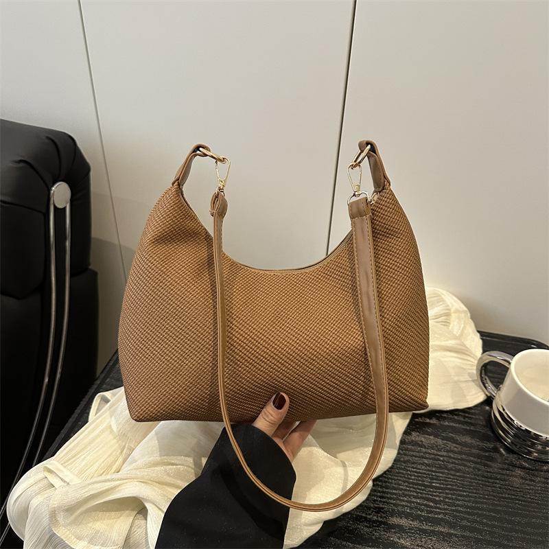 Knitted women's bags niche high-end new popular bags women's messenger bags commuter versatile shoulder armpit bags